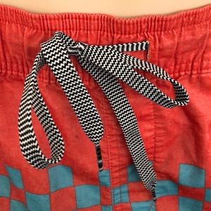 C/ / Y / A Men’s swim trunks Size Sml orange& turq
